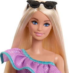 Barbie con 3 outfit completi