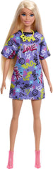 Barbie con 3 outfit completi