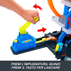 Hot Wheels City - Playset Mega Loop Garage con macchinina ed elicottero