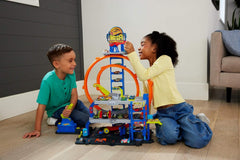 Hot Wheels City - Playset Mega Loop Garage con macchinina ed elicottero