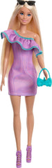 Barbie con 3 outfit completi